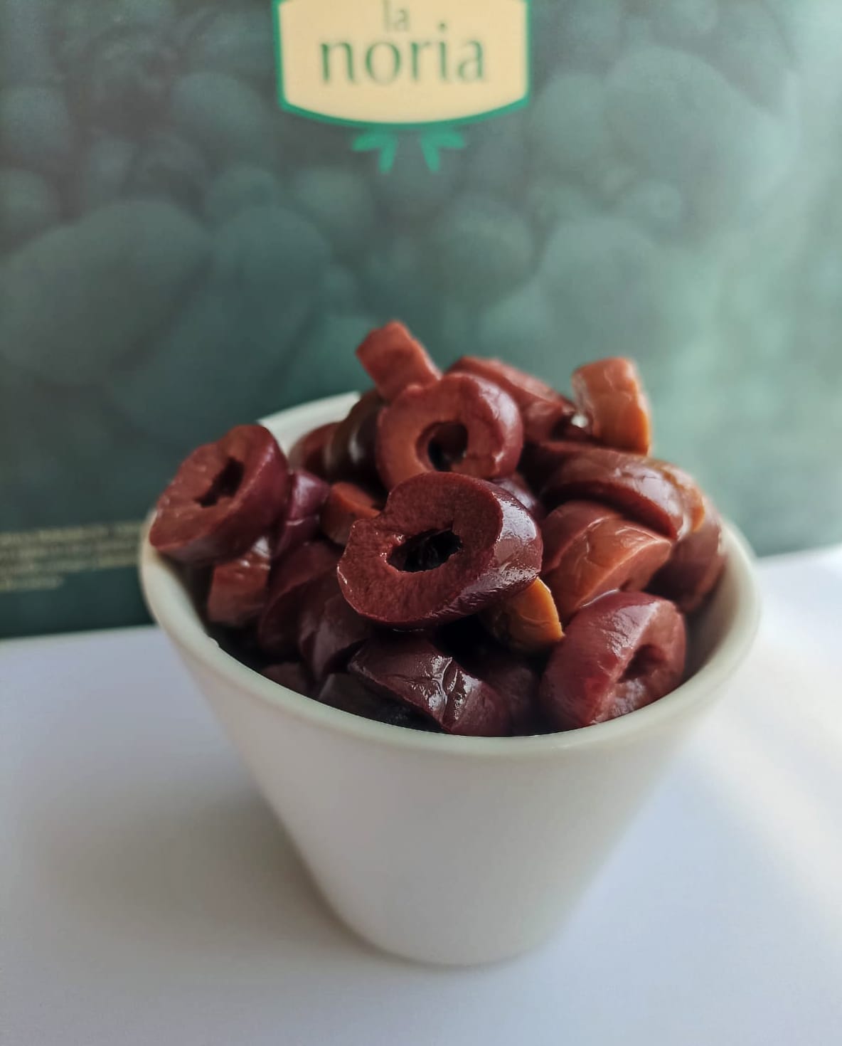 ACEITUNA NEGRA EN RODAJAS VARIEDAD MANZANILLA EN  SALMUERA